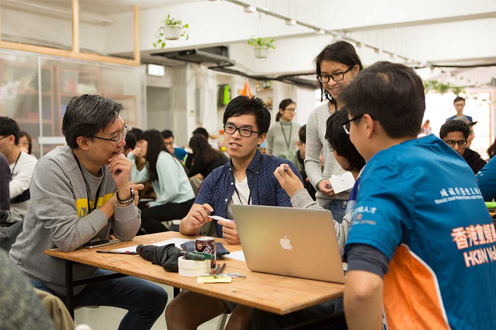 During prototype pitching, guests were eager to learn more about each invention.