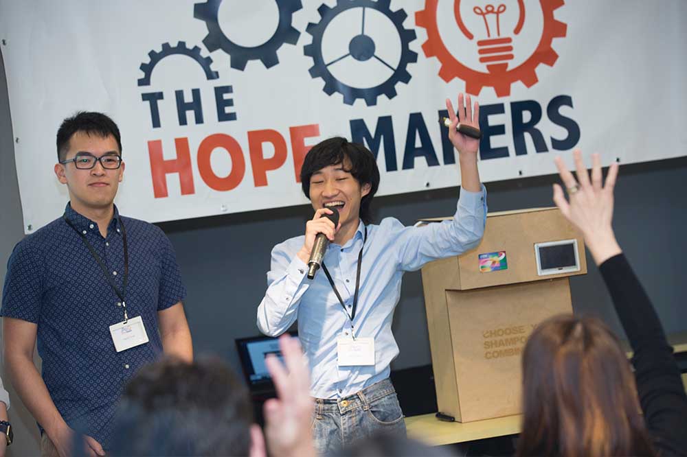 During prototype pitching, guests were eager to learn more about each invention. 